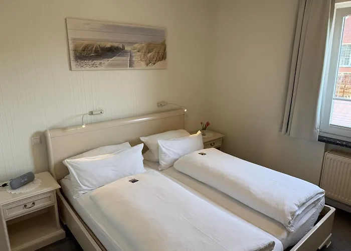 Гостевой дом Hotelpension Sanders Hoeft - Direkt Am Strandaufgang 4*